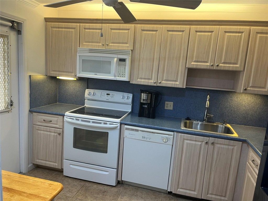 Photo of 3010 N Course Drive #409, Pompano Beach, FL 33069 (MLS # F10462272)