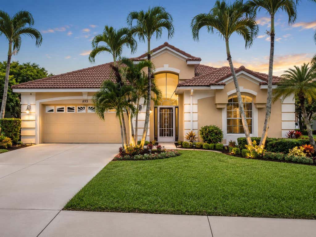Photo of 895 SW Lake Charles Circle, Port Saint Lucie, FL 34986 (MLS # B26043800)