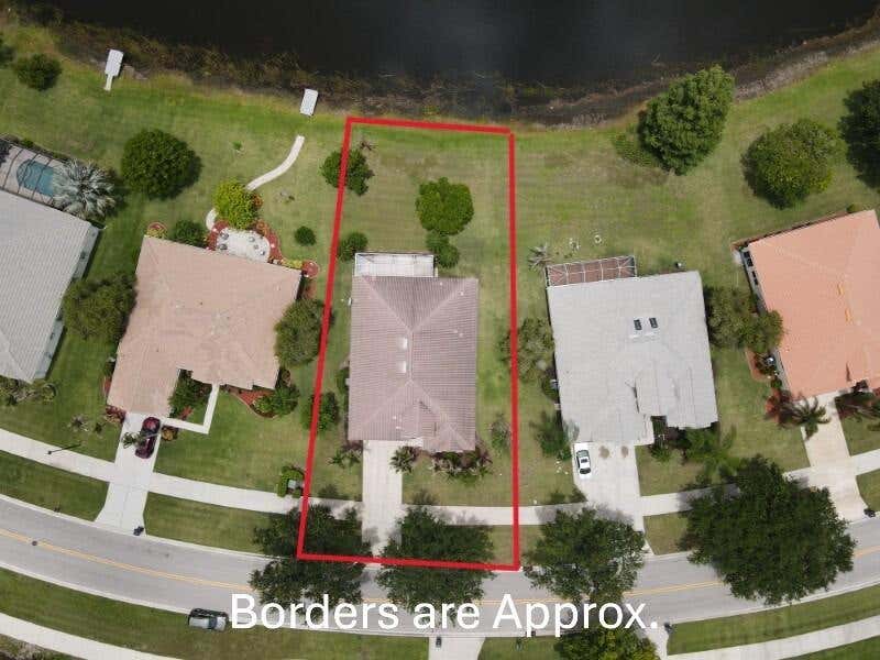 Photo of 895 SW Lake Charles Circle, Port Saint Lucie, FL 34986 (MLS # B26043800)