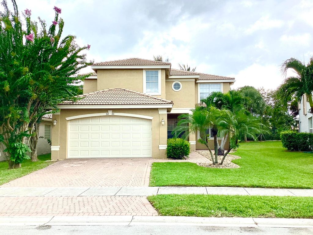 Photo of 5045 Nautica Lake Circle, Greenacres, FL 33463 (MLS # R11169845)