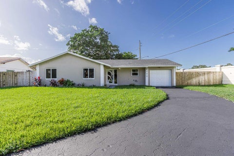 Photo of 8720 NW 46TH Street, Lauderhill, FL 33351 (MLS # B26090694)
