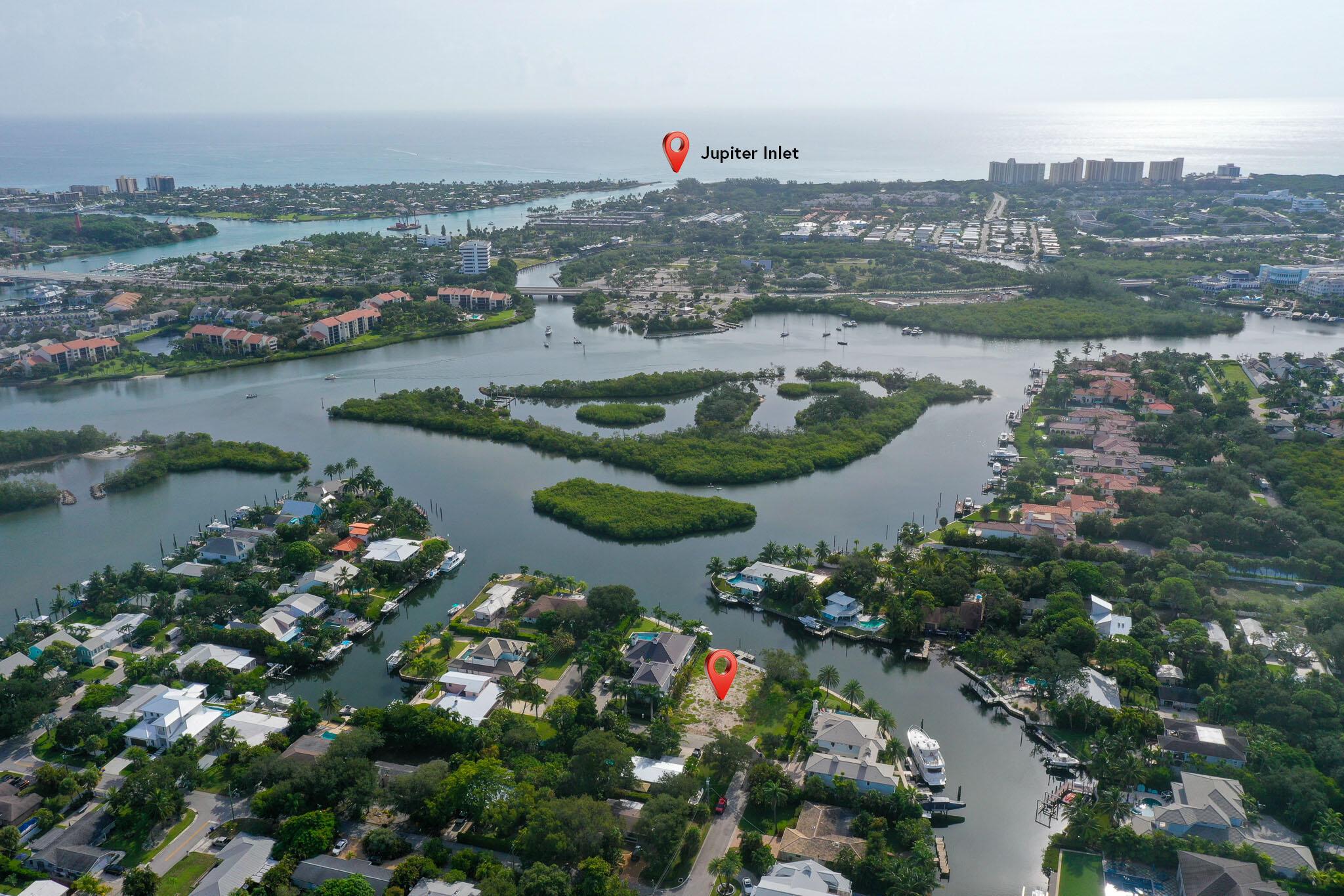 RARE!! Deep water, protected, large boat dockage! This homesite in Yacht Club Estates in Jupiter is ready to build! Approximately 85' of water frontage in this quaint non-HOA neighborhood. Direct access to Jupiter Inlet, no fixed bridges, close proximity to waterfront dining, shops, golf, and the crystal clear beaches of Jupiter. Full seawall replacement is in process at sellers expense. Custom house plans with pool are on hand and available.