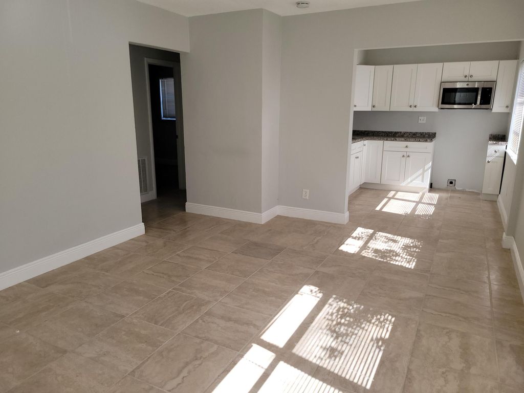 Photo of 651 NE 46 Th CT #S, Oakland Park, FL 33334 (MLS # B26030601)