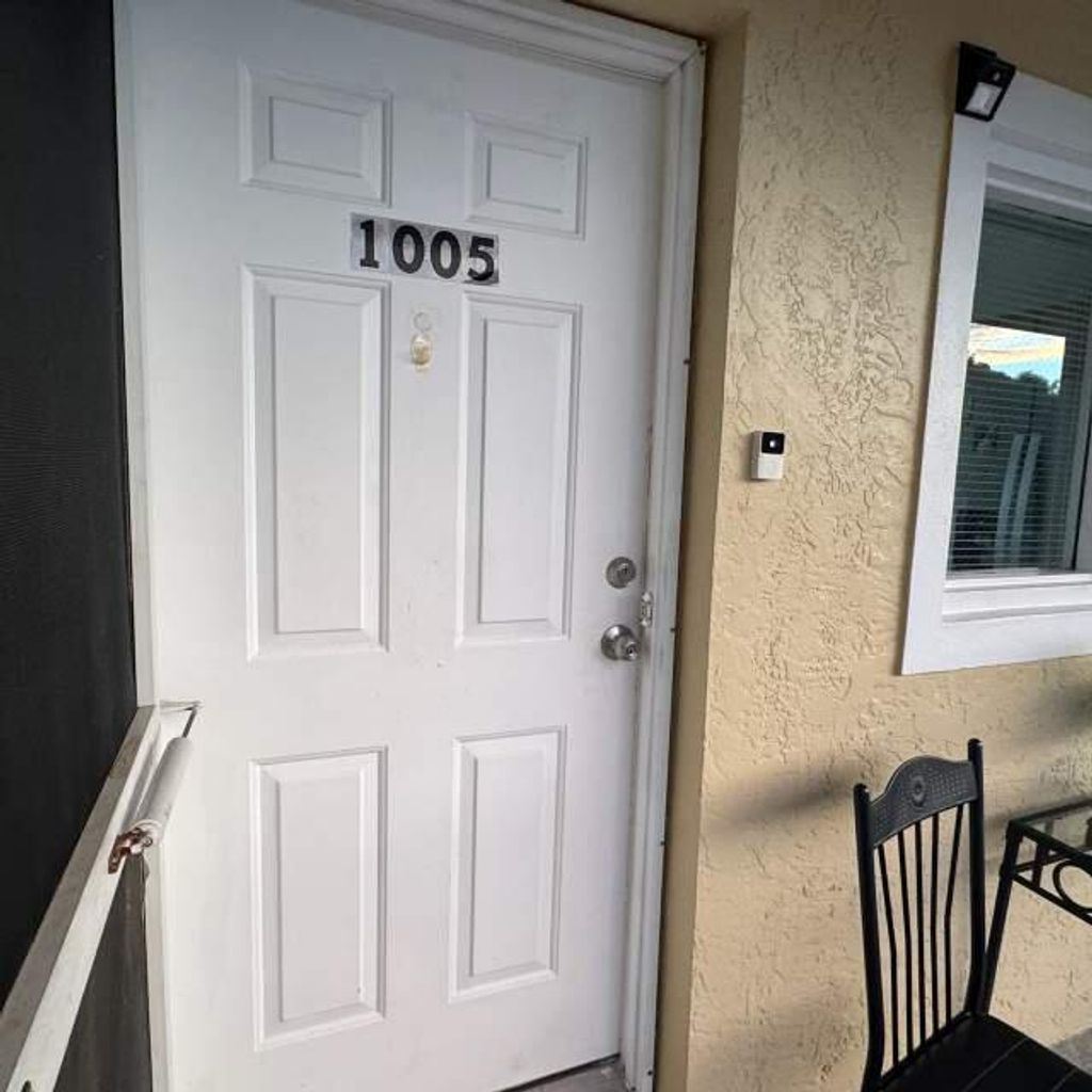 Photo of 1005 Palm Beach Trace Drive, Royal Palm Beach, FL 33411 (MLS # R11130084)