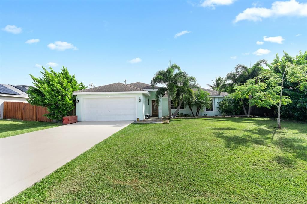 Photo of 3647 SW Ballweg Street, Port Saint Lucie, FL 34953 (MLS # R10753818)