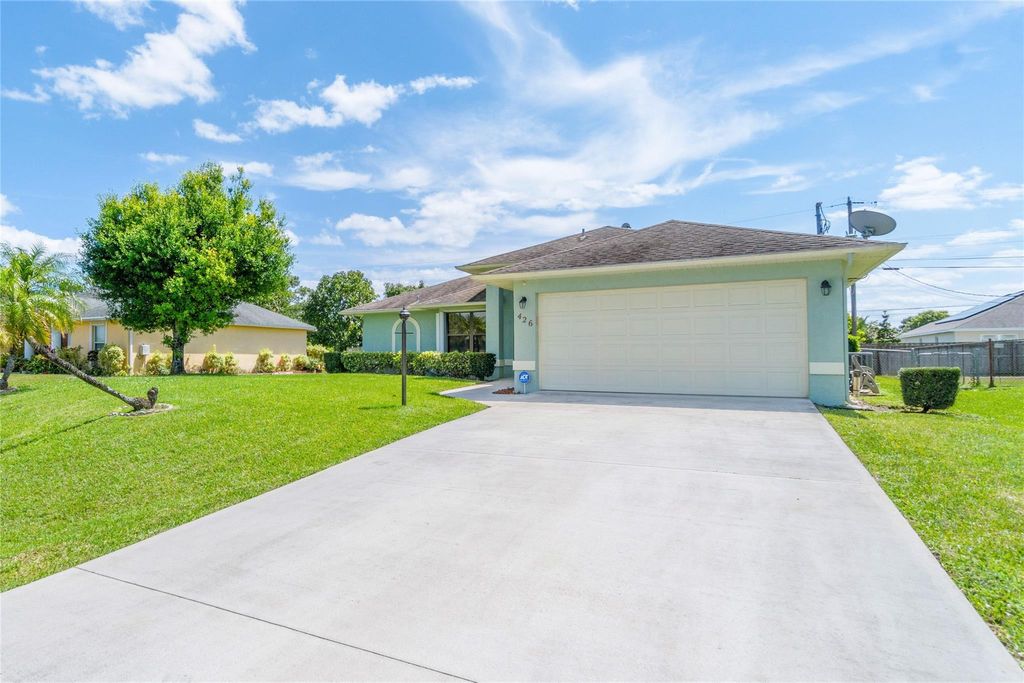 Photo of 426 SW Souris Avenue, Port Saint Lucie, FL 34953 (MLS # F10431681)