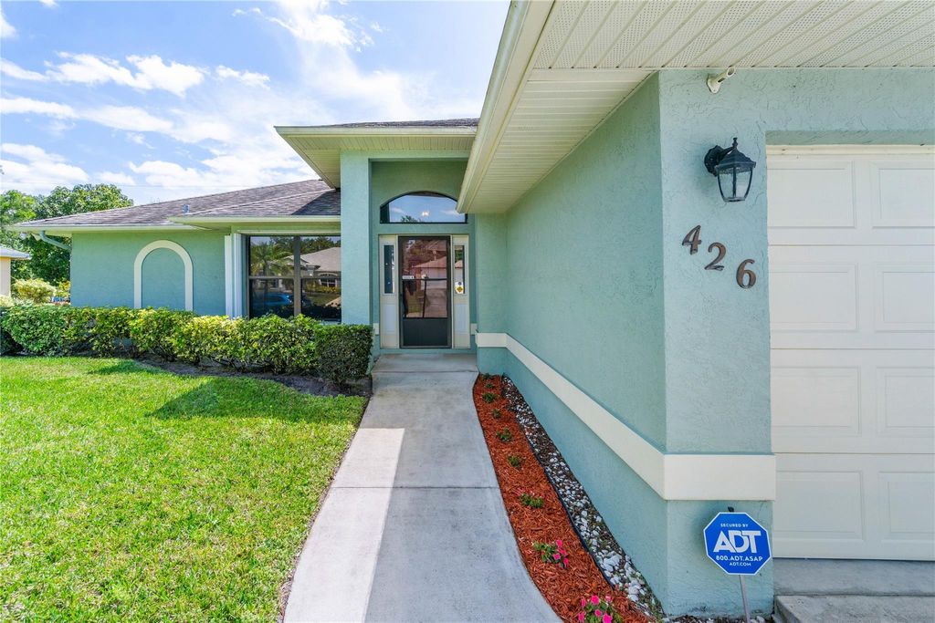 Photo of 426 SW Souris Avenue, Port Saint Lucie, FL 34953 (MLS # F10431681)