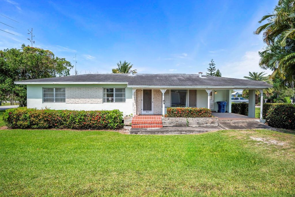 Photo of 800 NW 2nd Street, Belle Glade, FL 33430 (MLS # R10977351)