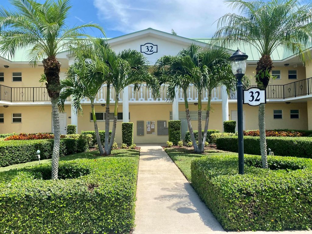 Photo of 32 Colonial Club Drive #102, Boynton Beach, FL 33435 (MLS # R11015030)
