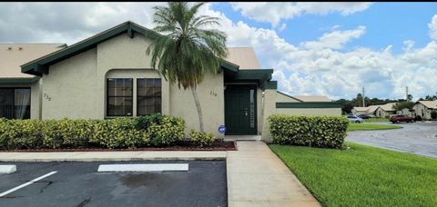 Photo of 750 SW Claudia Avenue, Port Saint Lucie, FL 34953 (MLS # R11136340)