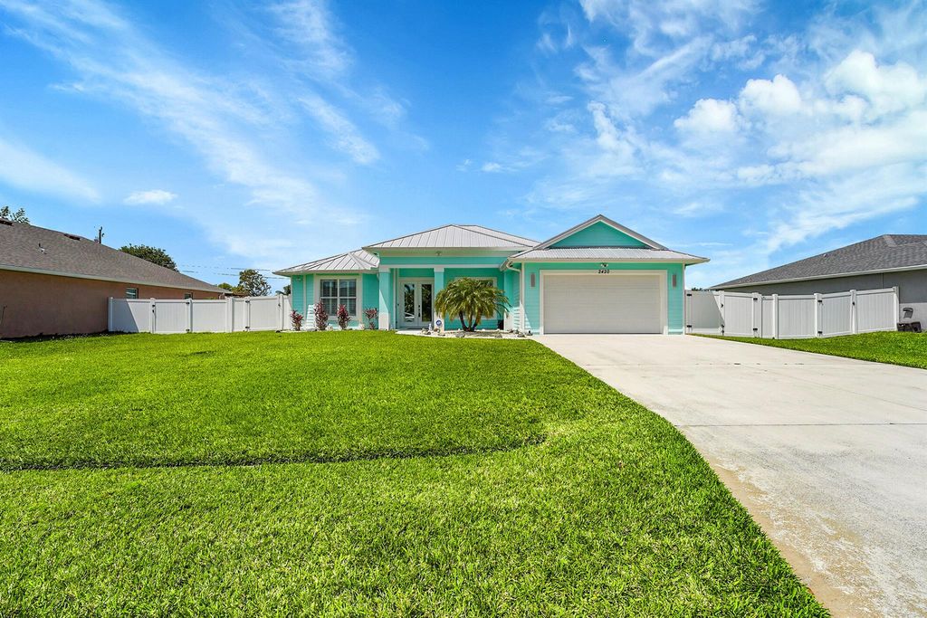 Photo of 2420 SE Rock Springs Drive, Port Saint Lucie, FL 34952 (MLS # R11078628)