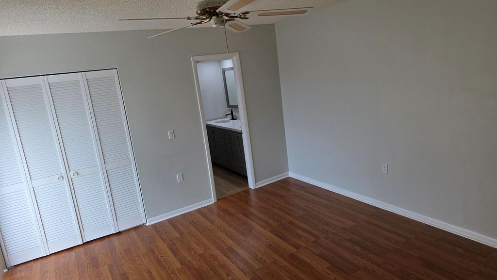 Photo of 5609 SE Windsong Lane, Stuart, FL 34997 (MLS # R11119312)