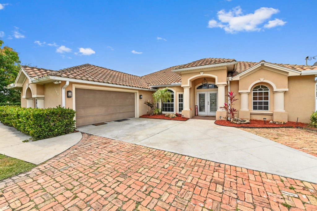 Photo of 3766 SW Savona Boulevard, Port Saint Lucie, FL 34953 (MLS # R11058763)