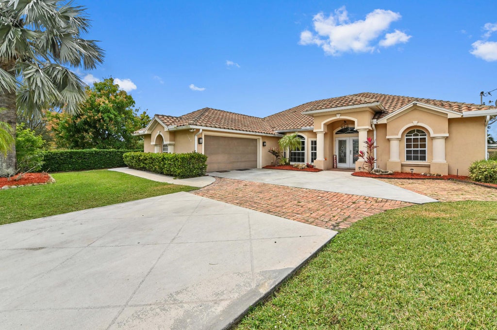 Photo of 3766 SW Savona Boulevard, Port Saint Lucie, FL 34953 (MLS # R11058763)