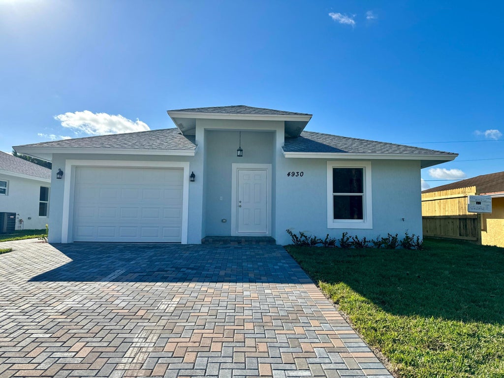 Photo of 4930 Biscayne Drive, Lake Worth, FL 33463 (MLS # R10944068)