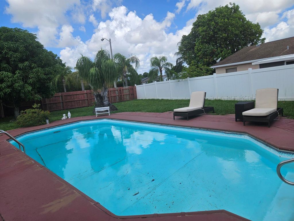 Photo of 6074 Moonbeam Drive, Lake Worth, FL 33463 (MLS # R11028500)