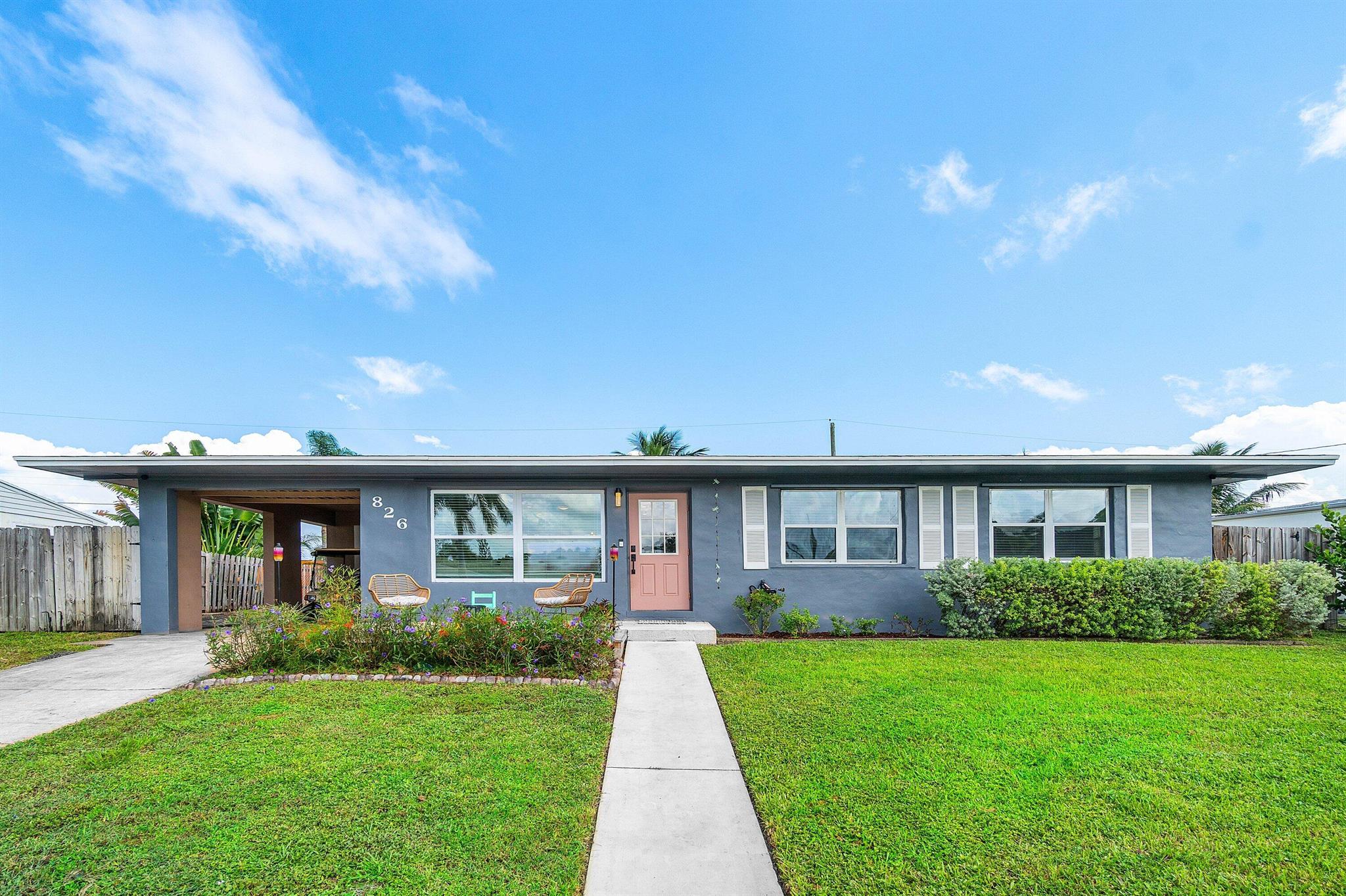 Charming 3-Bed, 2-Bath Home w/Carport - Loaded w/ Upgrades! Welcome to this updated home w/ a carport & space for your toys! This gem boasts stylish vinyl laminate flooring & updated baseboards throughout. The kitchen's been upgraded w/solid wood cabinets, quartz countertops, kitchen island, new appliances, recessed lighting, & pendant lights that elevate the space. Bathrooms have been tastefully renovated. Additional updates include newer gas washer, dryer, & water heater, A/C system w/all new ductwork installed in 2019. All new interior doors. Brand new windows in the front bedrooms, rear sliding glass door & front door. Exterior freshly painted 2024, Clusia hedges w/drip irrigation & new fence for extra privacy! 8x10 shed included! MOVE IN READY! Call to schedule your private showing!