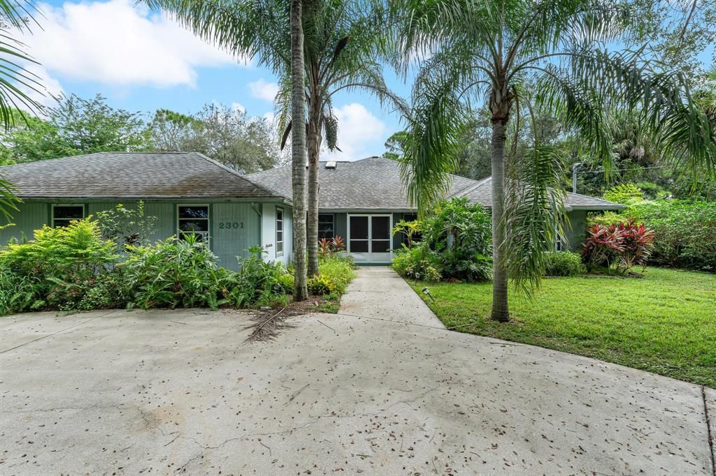 Photo of 2301 SW Sala Street, Port Saint Lucie, FL 34953 (MLS # R10752234)