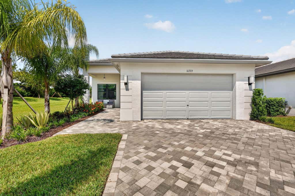Photo of 11777 SW MARINE Way, Port Saint Lucie, FL 34987 (MLS # B26064612)
