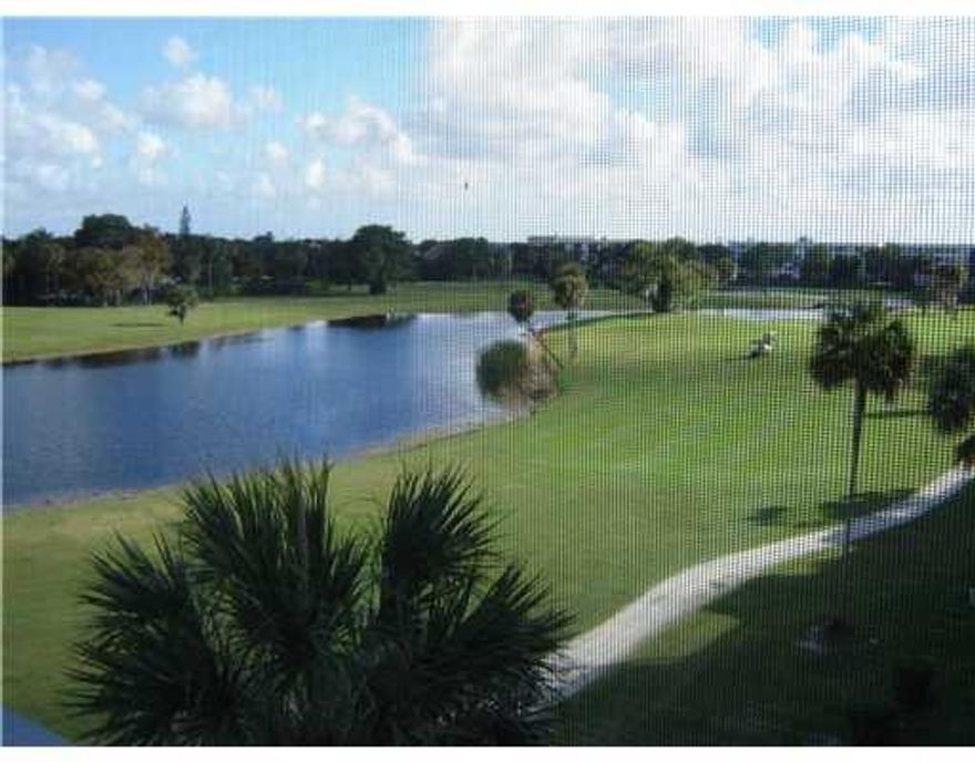 Popular "F" unit with one of the nicest view in Palm-Aire, all new SS appliances, laundry room with full size washer/dryer, near park with tennis, basketball, handball, children's play area & mpore, Publix @Palm-Aire and Skolnick Community Center just a short drive.  Minutes to I-95 & Turnpike, Isle Casino across street.