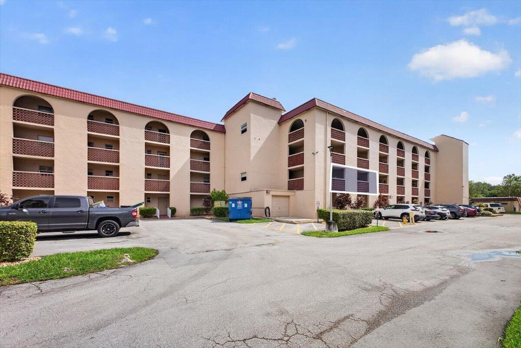 Photo of 3251 HOLIDAY SPRINGS Boulevard #205, Margate, FL 33063 (MLS # B26080785)