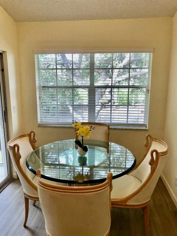 Great Condo overlooking Golf course in Boca Country Club which is now open to Public to use. New flooring throughout. Unit is being updated so pictures do not do it justice.