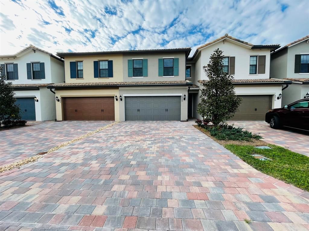 Photo of 8208 Tailshot Court Ct, Lake Worth Beach, FL 33467 (MLS # R10776501)