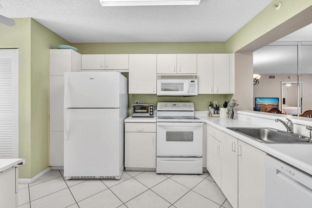 Photo of 9537 Weldon Circle #I213, Tamarac, FL 33321 (MLS # B26011393)