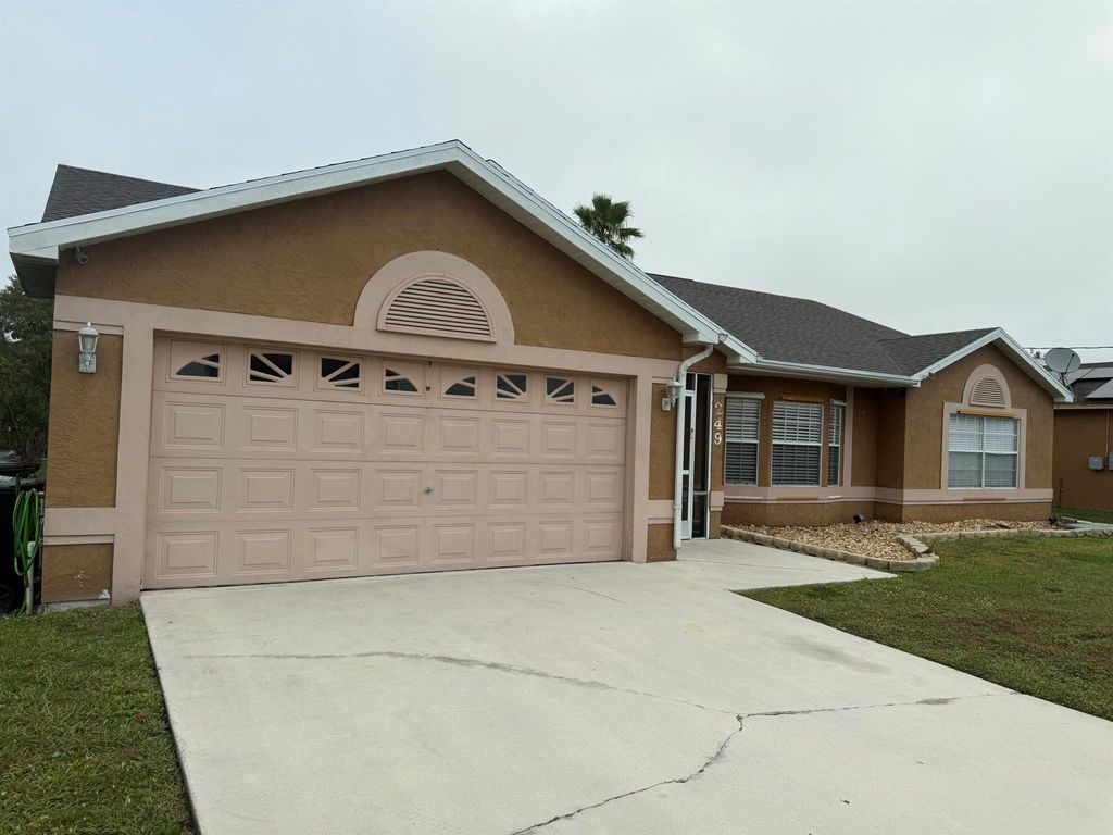 Photo of 249 SW Whitmore Drive, Port Saint Lucie, FL 34984 (MLS # R11148882)