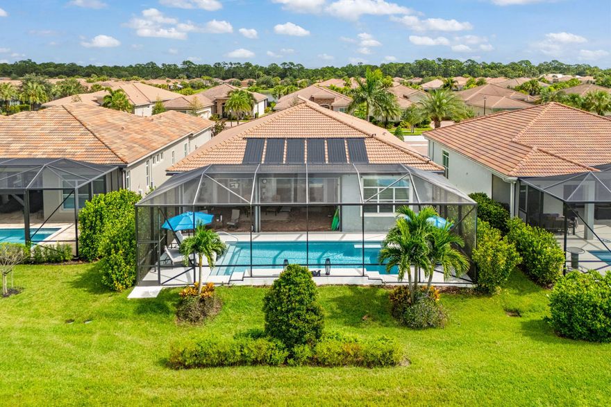 Enjoy luxury living in this beautifully upgraded 3,000sft home, located in prestigious PGA Verano golf community. Step inside to discover a bright open floor plan fully tiled throughout, enhanced by crown molding and custom wall moldings in the dining room and den. Plantation shutters, upgraded fans, and designer light fixtures add a refined touch throughout the home. The spacious open-concept kitchen features a massive quartz island, sleek white cabinetry, wall oven, and stainless steel appliances--a chef's dream and an entertainer's delight. Enjoy outdoor living year-round with the screened-in pool with solar-heat and electric heat backup! The expansive lanai affords privacy complete with electric-powered storm screens for added weather protection. This property backs up to a wide canal