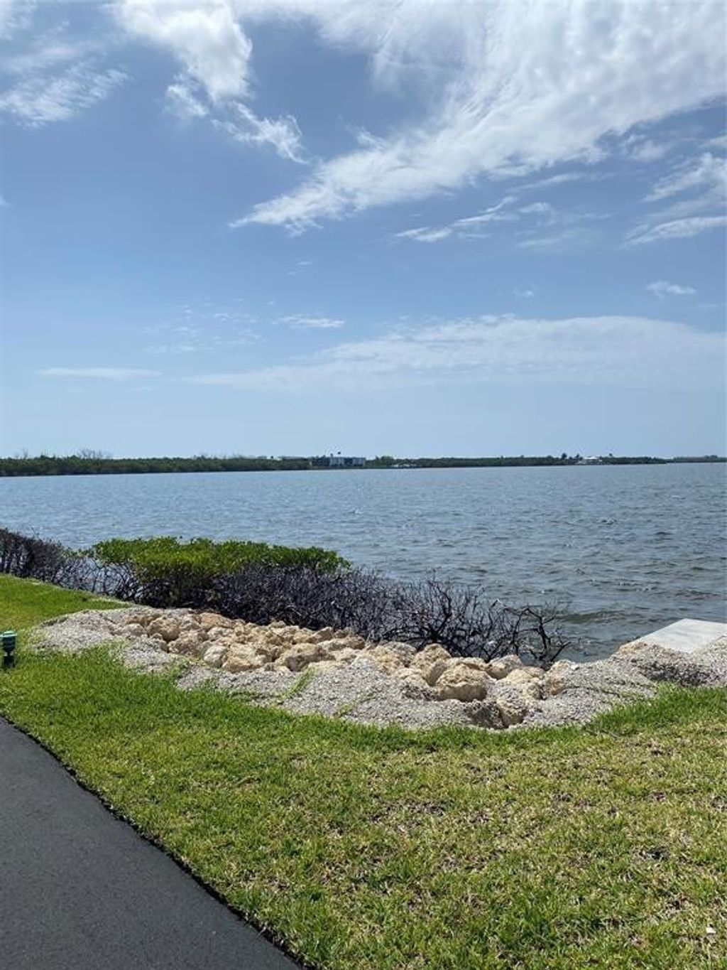 Photo of 3432 NE Causeway Boulevard #102, Jensen Beach, FL 34957 (MLS # F10457672)