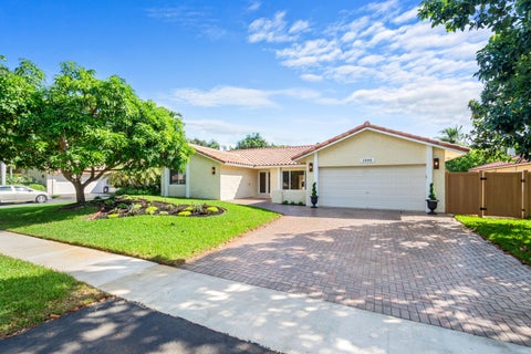 Photo of 1340 NW 97TH Avenue, Plantation, FL 33322 (MLS # B26087748)