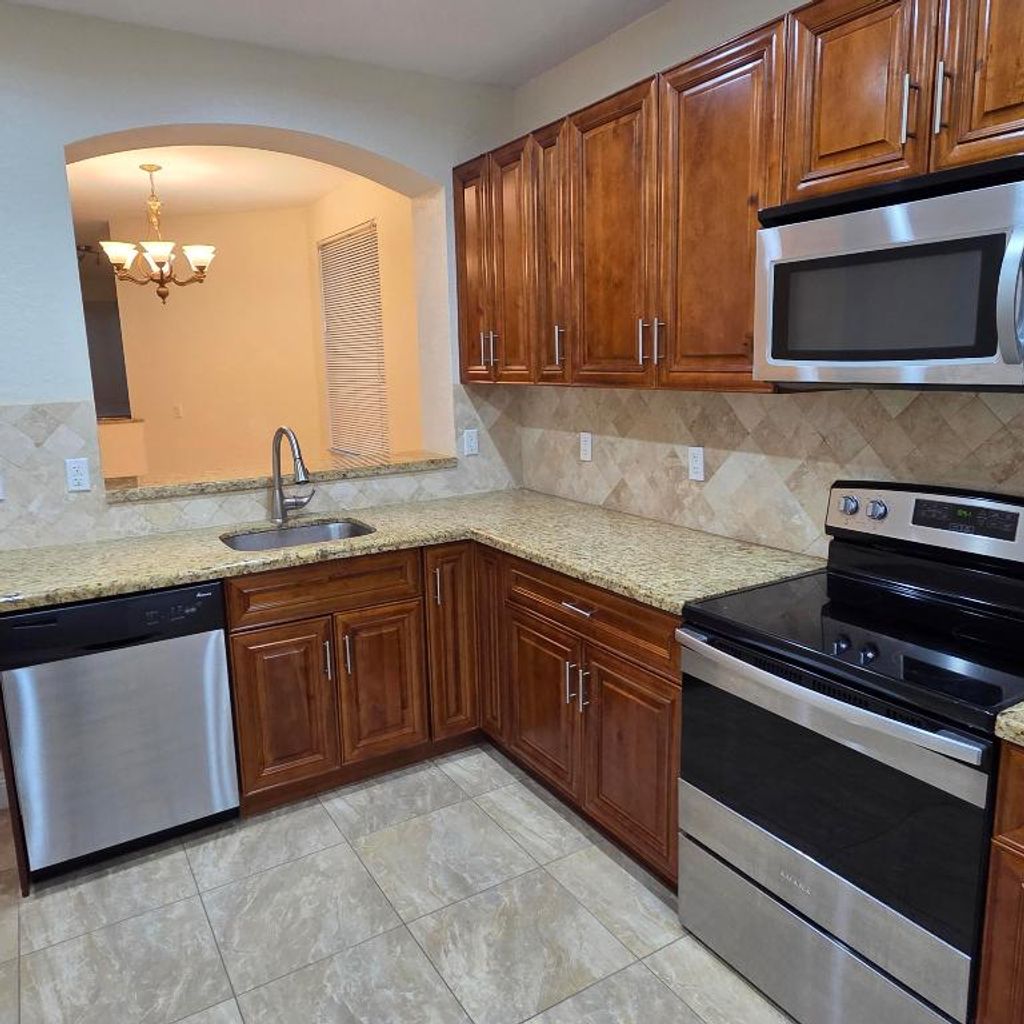 Photo of 2791 S Evergreen Circle, Boynton Beach, FL 33426 (MLS # R11125756)