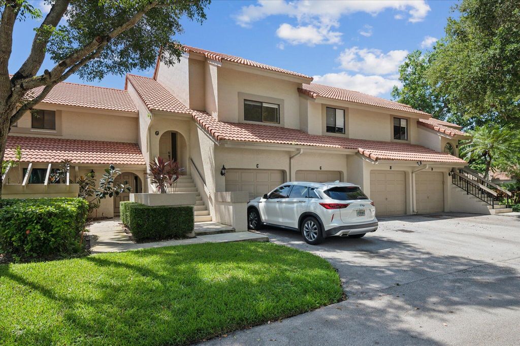 Photo of 5750 Coach House Circle #G, Boca Raton, FL 33486 (MLS # B26042453)
