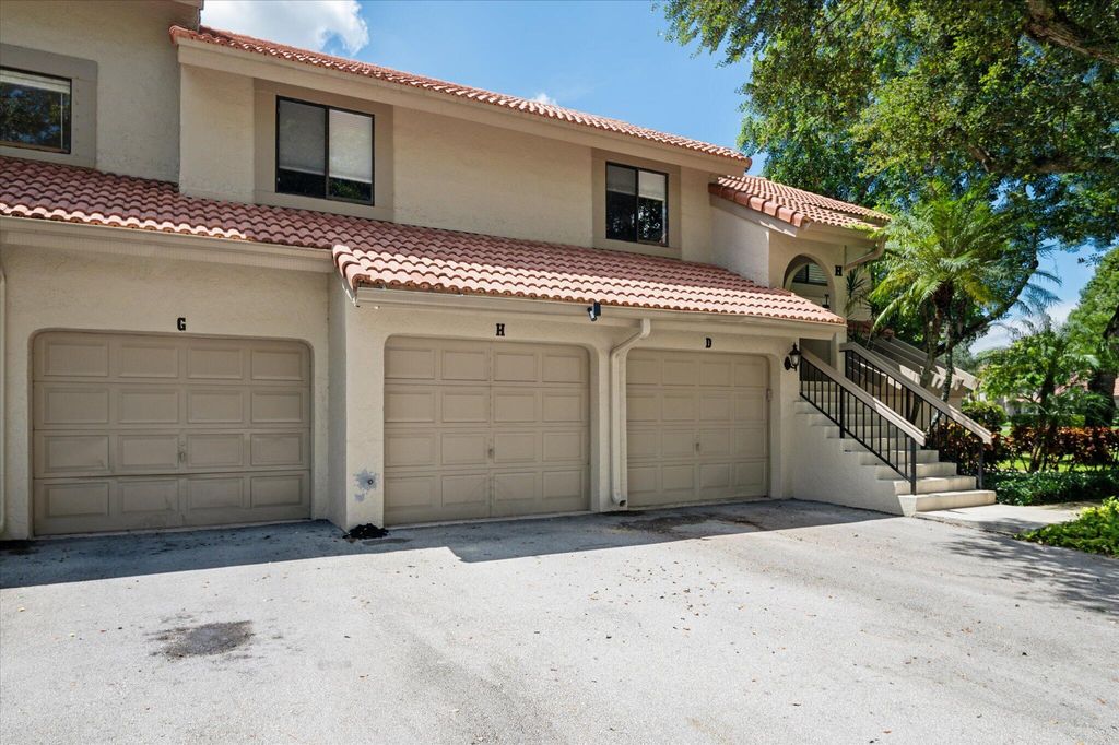 Photo of 5750 Coach House Circle #G, Boca Raton, FL 33486 (MLS # B26042453)