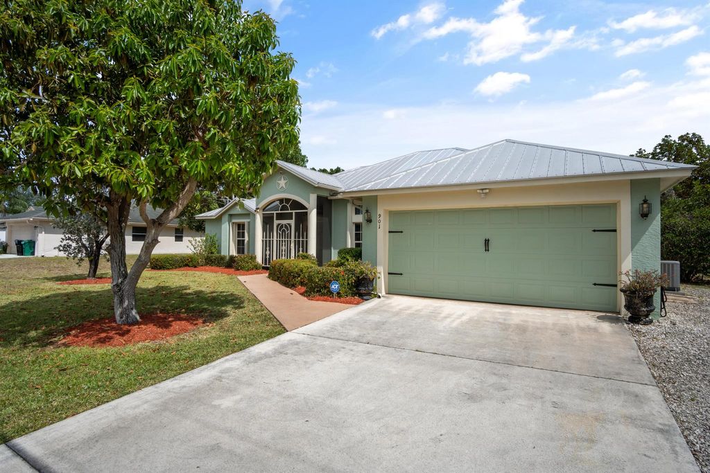 Photo of 901 SW Idol Avenue, Port Saint Lucie, FL 34953 (MLS # R11083857)