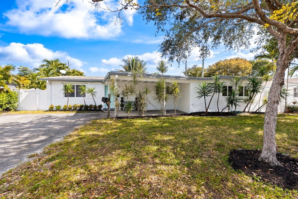 Photo of 5660 NE 2nd Terrace, Oakland Park, FL 33334 (MLS # B26093720)