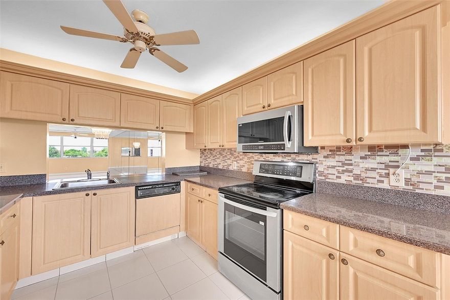 55+ Community, Building 190, unit 403, Phase IV, top floor, Riviera model in the Islands, with separate large laundry room and an updated kitchen, carpet and tile.  Enjoy the great water views from extended FLA room giving you more living space.  Updated kitchen and bathroom.  Newer A/C  55+ COMMUNITY WITH A MAIN CLUBHOUSE, SAUNAS, BBQ, PICNIC AREAS, BILLIARDS, THEATER, CABANAS, COURTESY BUSSES TO STORES AND SAWGRASS MILLS MALL, INDOOR AND OUTDOOR POOLS AND FITNESS ROOM IN THE SOUGHT AFTER SUNRISE LAKES PHASE IV.