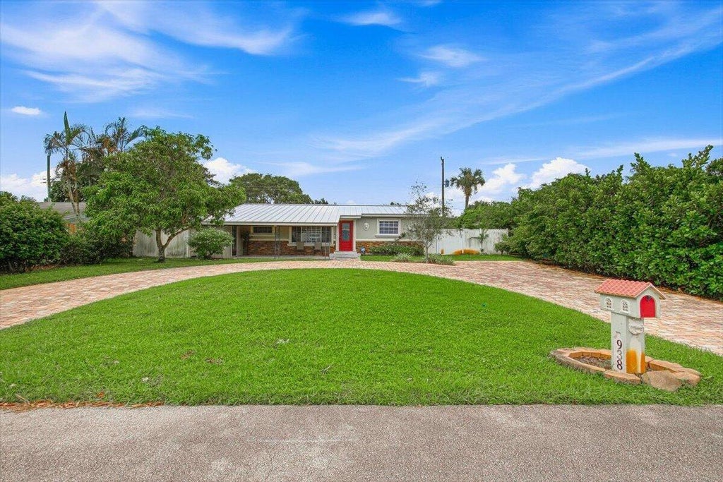 Photo of 938 Arlington Drive, West Palm Beach, FL 33415 (MLS # B26075344)