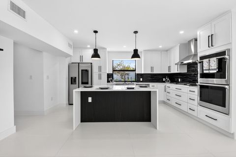 Tiny photo for 1410 Beta Court N, Lake Clarke Shores, FL 33406 (MLS # R11159869)