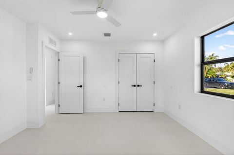 Tiny photo for 1410 Beta Court N, Lake Clarke Shores, FL 33406 (MLS # R11159869)