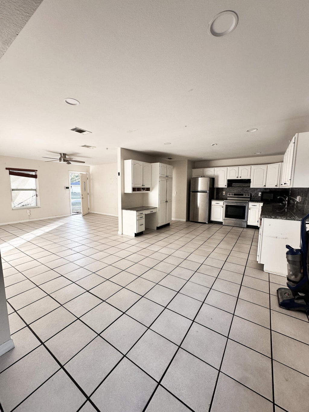 Photo of 410 SW Kentwood Road, Port Saint Lucie, FL 34953 (MLS # B26039193)