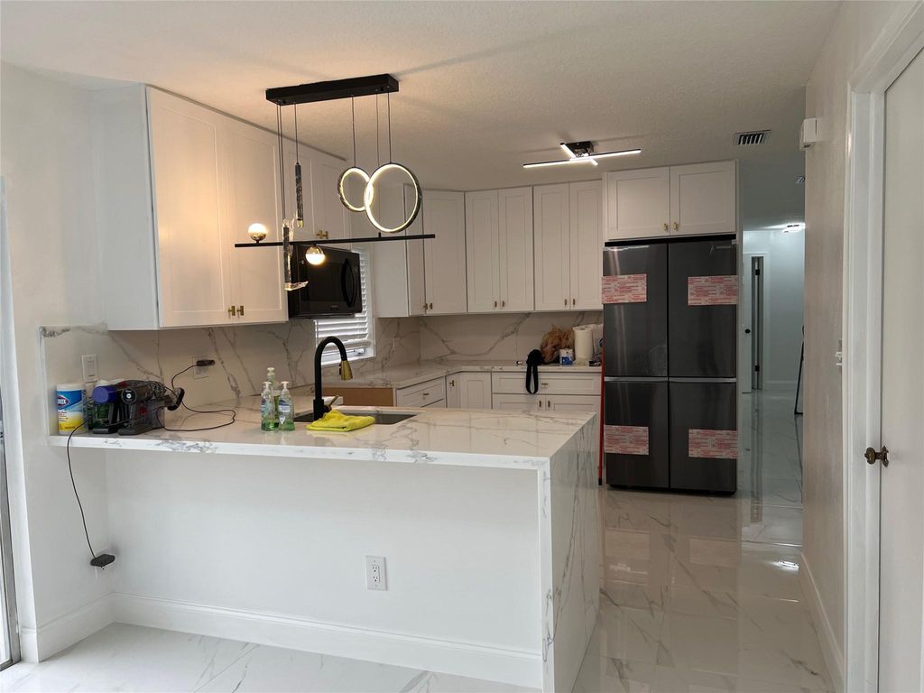 Photo of 22062 Acapulco Court, Boca Raton, FL 33428 (MLS # F10419434)