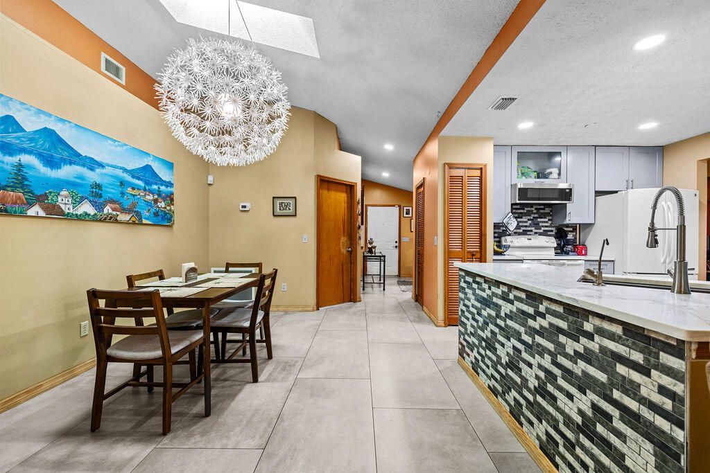 Photo of 2951 SE Bella Road, Port Saint Lucie, FL 34984 (MLS # R11123956)