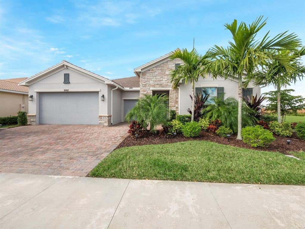 Photo of 9997 SW Coral Tree Circle, Port Saint Lucie, FL 34987 (MLS # R10767387)