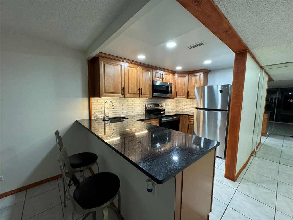 Photo of 3720 Inverrary Drive #1U, Lauderhill, FL 33319 (MLS # F10426159)