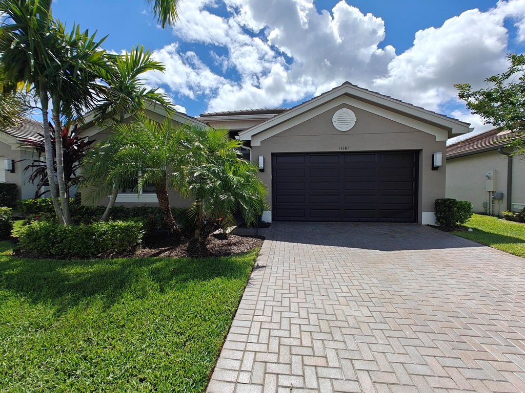 Photo of 11681 SW Hawthorne Hill Road, Port Saint Lucie, FL 34987 (MLS # R10999759)
