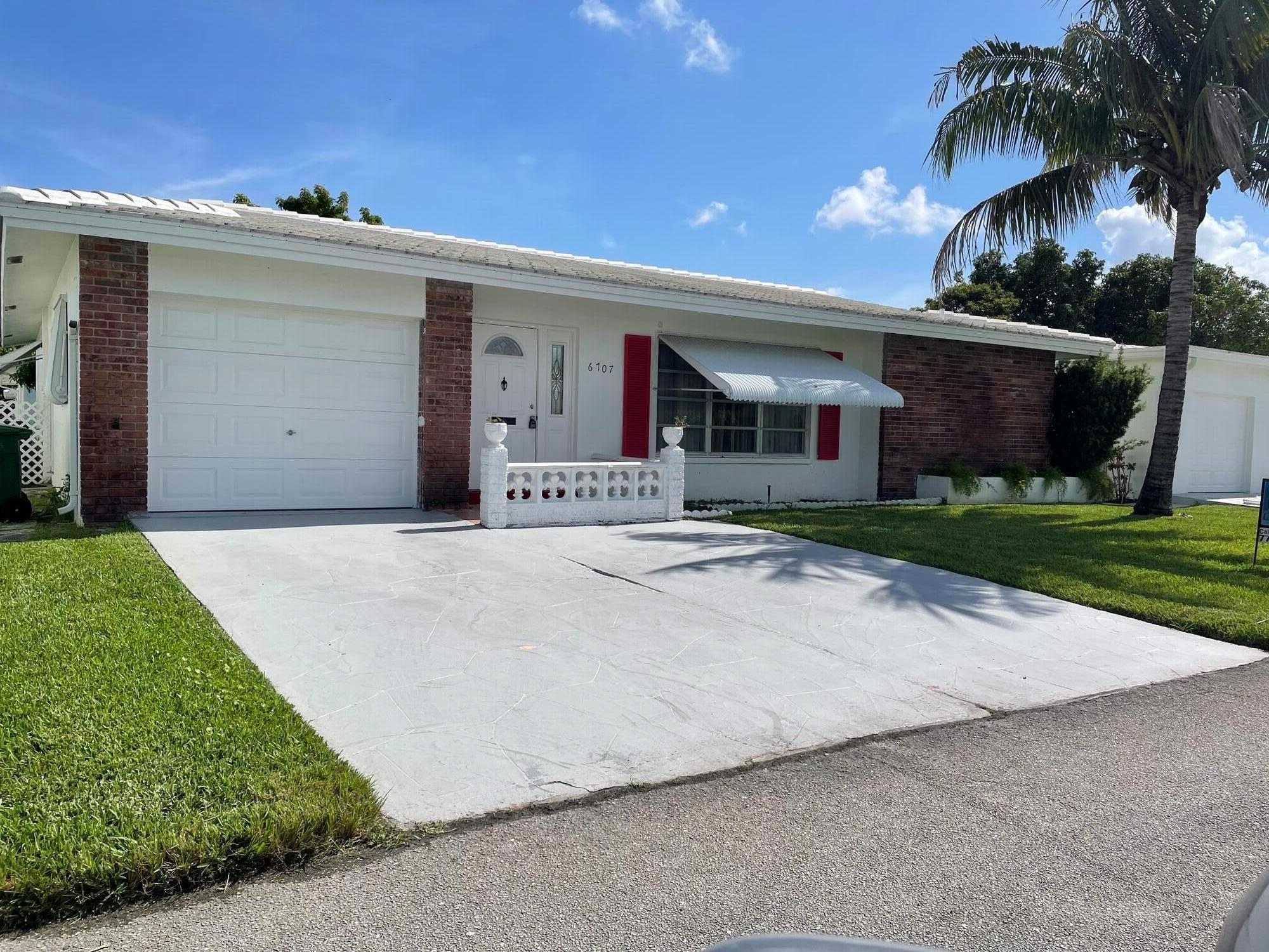 AGGRESIVELY PRICED TO SELL. 55+ COMMUNITY WITH LOW HOA FEES WHICH INCLUDE EXTERIOR HOME & ROOF PAINTING, LAWN & SPRINKLER SYSTEM MAINTENANCE WITH LAKE WATER. MAJOR IMPROVEMENTS INCLUDE: FLAT TILE ROOF REPLACED 02/2023, ELECTRIC UPDATED 2023, BRAND NEW HOT WATER HEATER & CENTAL A/C SYSTEM REPLACED 07/ 2024. SPLIT BEDROOM PLAN FOR PRIVACY. KING SIZE PRIMARY BEDROOM, LARGE WALK IN CLOSET (CUSTOM SHELVING SYSTEM), REMODELED PRIMARY BATHROOM FEATURING GRANITE COUNTER TOP, TWO SINKS & LARGE VANITY. SECOND BATHROOM HAS ALSO BEEN REMODELED. BOTH BATHROOMS HAVE BEEN RETILED.CUSTOM WALL MIRRORS IN LIVING ROOM, DINING ROOM & DEN. UPSCALE KITCHEN CABINETS. LARGE INTERIOR LAUNDRY ROOM. FOUR INDIVIDUAL SLIDING GLASS DOORS LEADING TO OVERSIZED LANAI (390 SQUARE FEET) TILED, SCREENED & ROOFED.