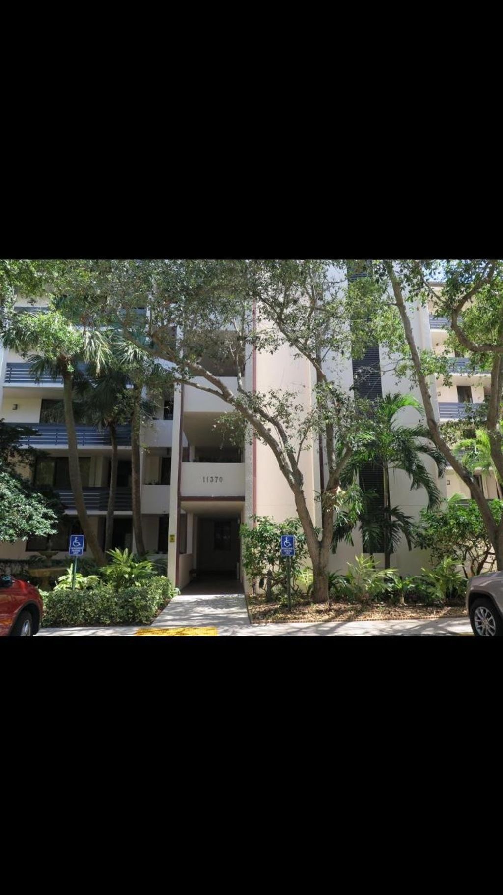 Photo of 11370 Twelve Oaks Way #312, North Palm Beach, FL 33408 (MLS # R10900624)