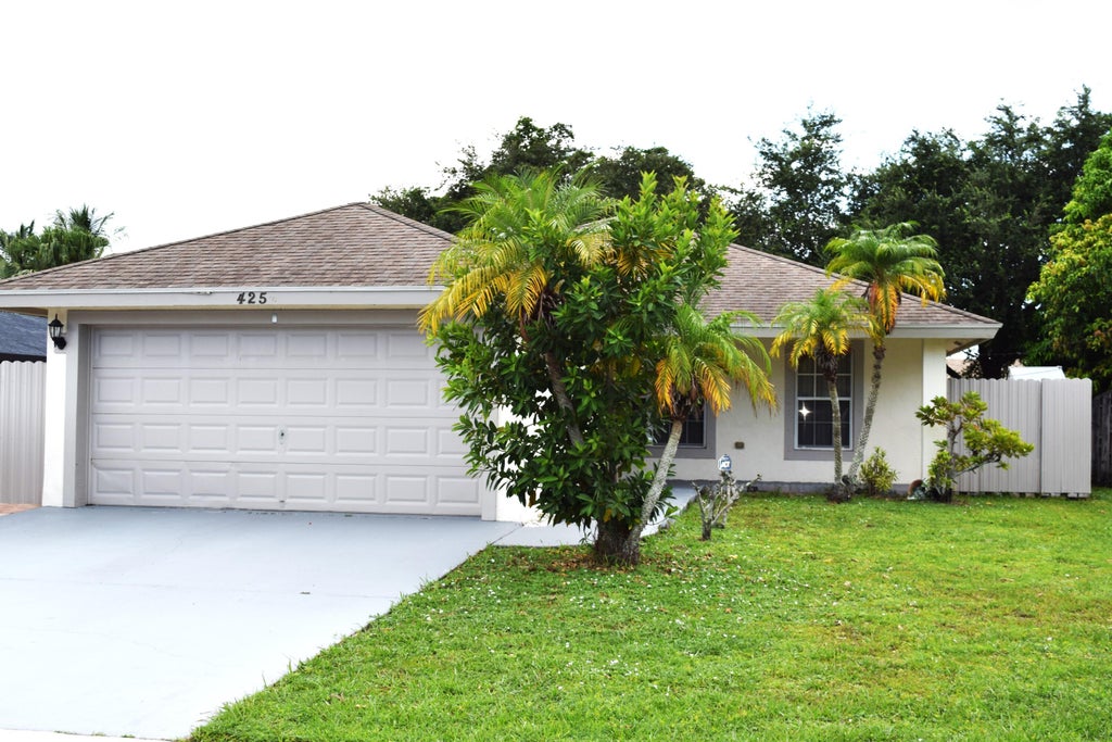 Photo of 425 PERRY Avenue, Greenacres, FL 33463 (MLS # B26069866)
